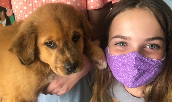 Michelle and her very cute golden retriever puppy