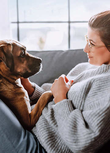 Pet Owner with her cat and dog
