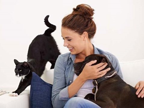 Pet Owner with her cat and dog